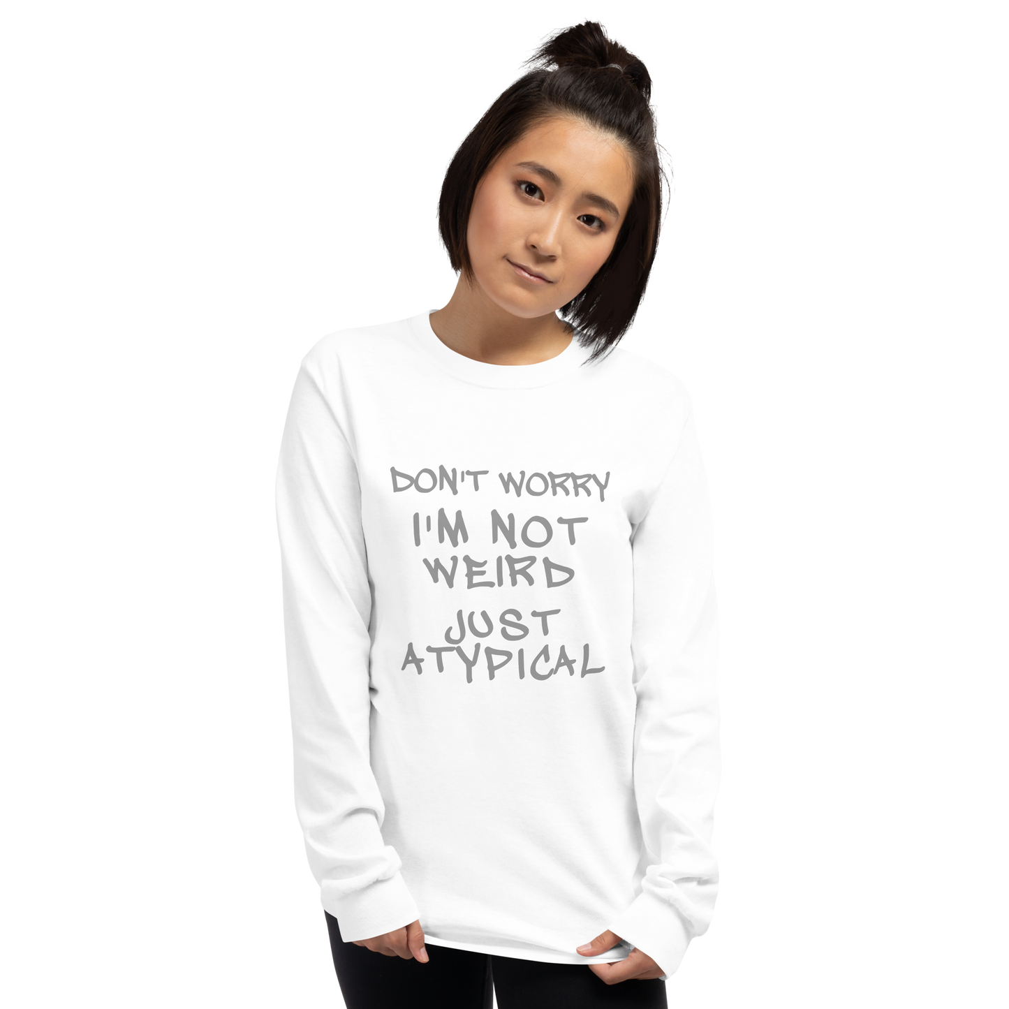 "Don't Worry I'm Not Weird Just Atypical" printed on a white men's long sleeve shirt worn by a female