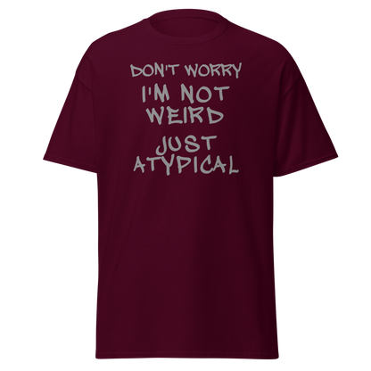 "Don't Worry I'm Not Weird Just Atypical" printed on a maroon on an invisible body