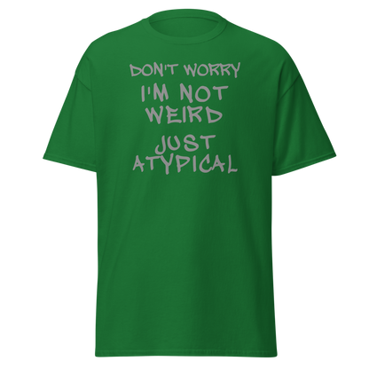"Don't Worry I'm Not Weird Just Atypical" printed on a turf green on an invisible body
