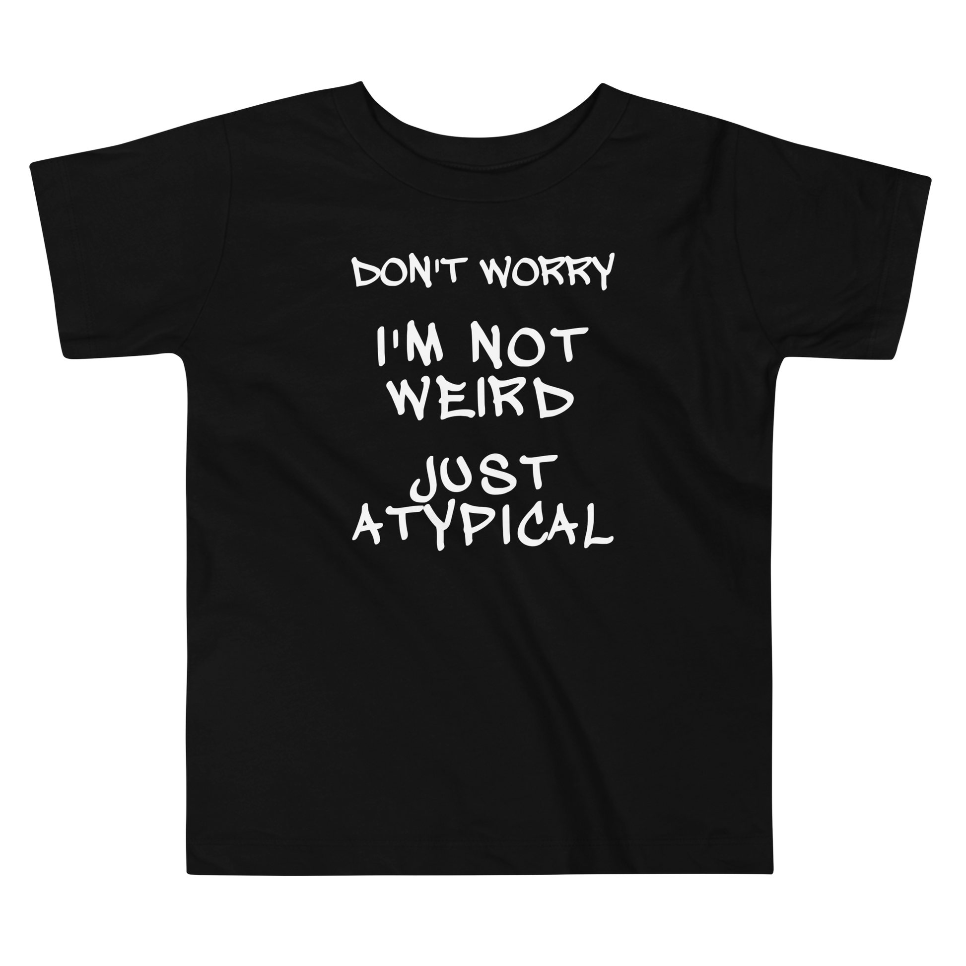 "Don't Worry I'm Not Weird Just Atypical" printed on a black toddler short sleeve tee laying on a flat surface