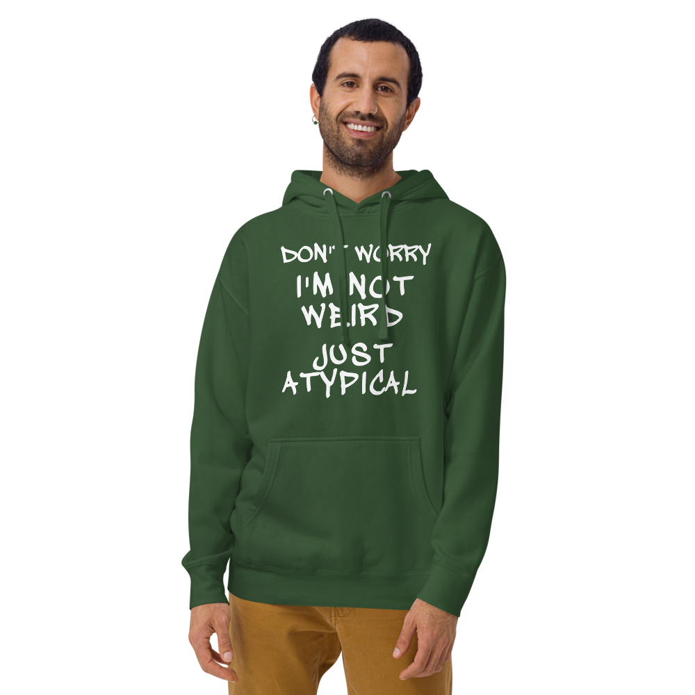 "Don't Worry I'm Not Weird Just Atypical" printed on a forest green warn by a male