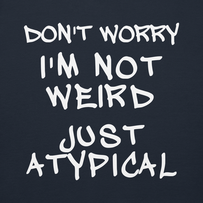 "Don't Worry I'm Not Weird Just Atypical" printed on a navy blazer background