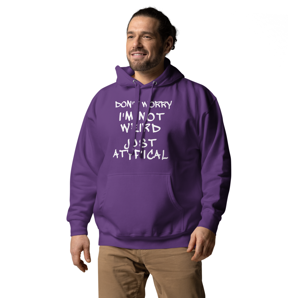 "Don't Worry I'm Not Weird Just Atypical" printed on a purple unisex hoodie worn by a male