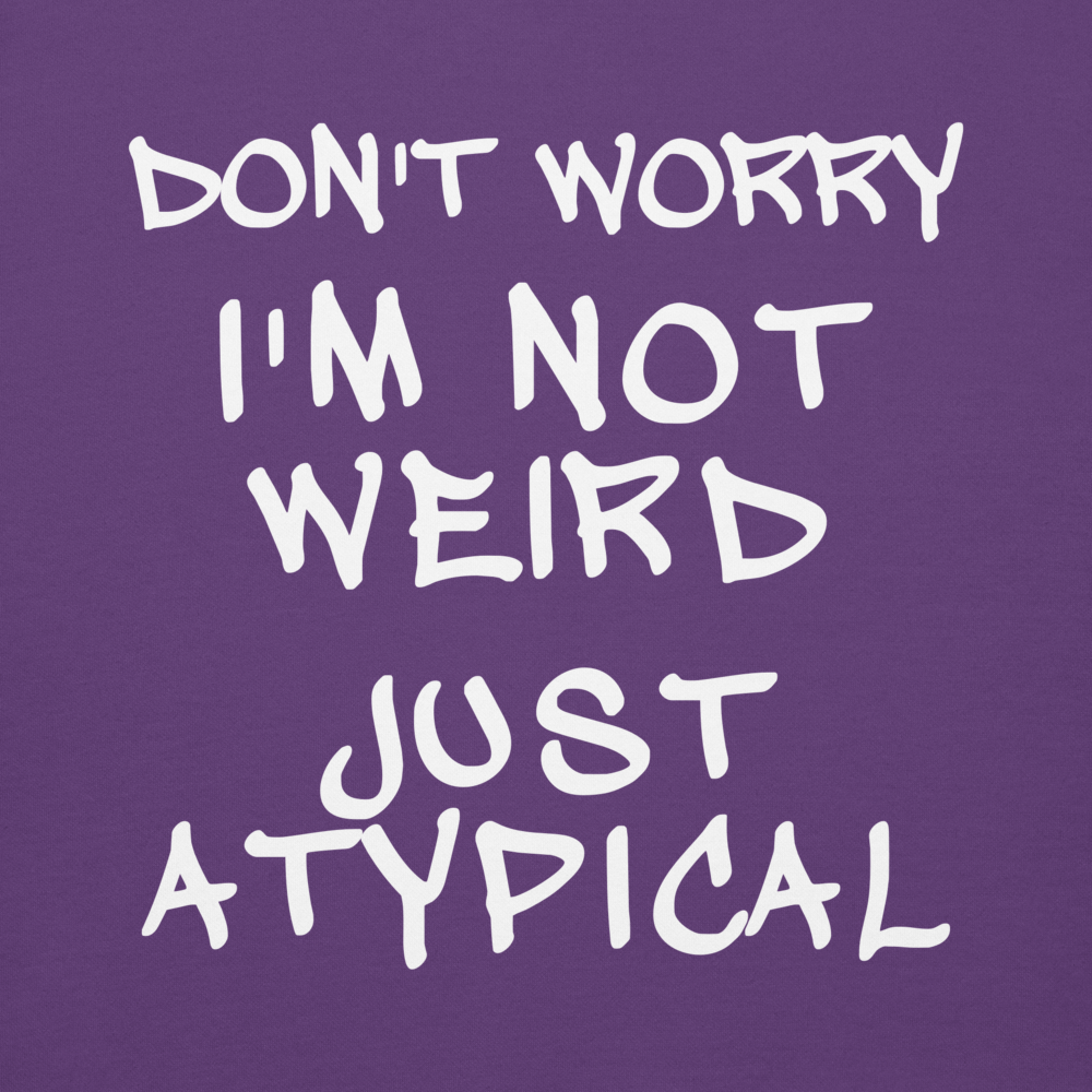 "Don't Worry I'm Not Weird Just Atypical" printed on a purple background