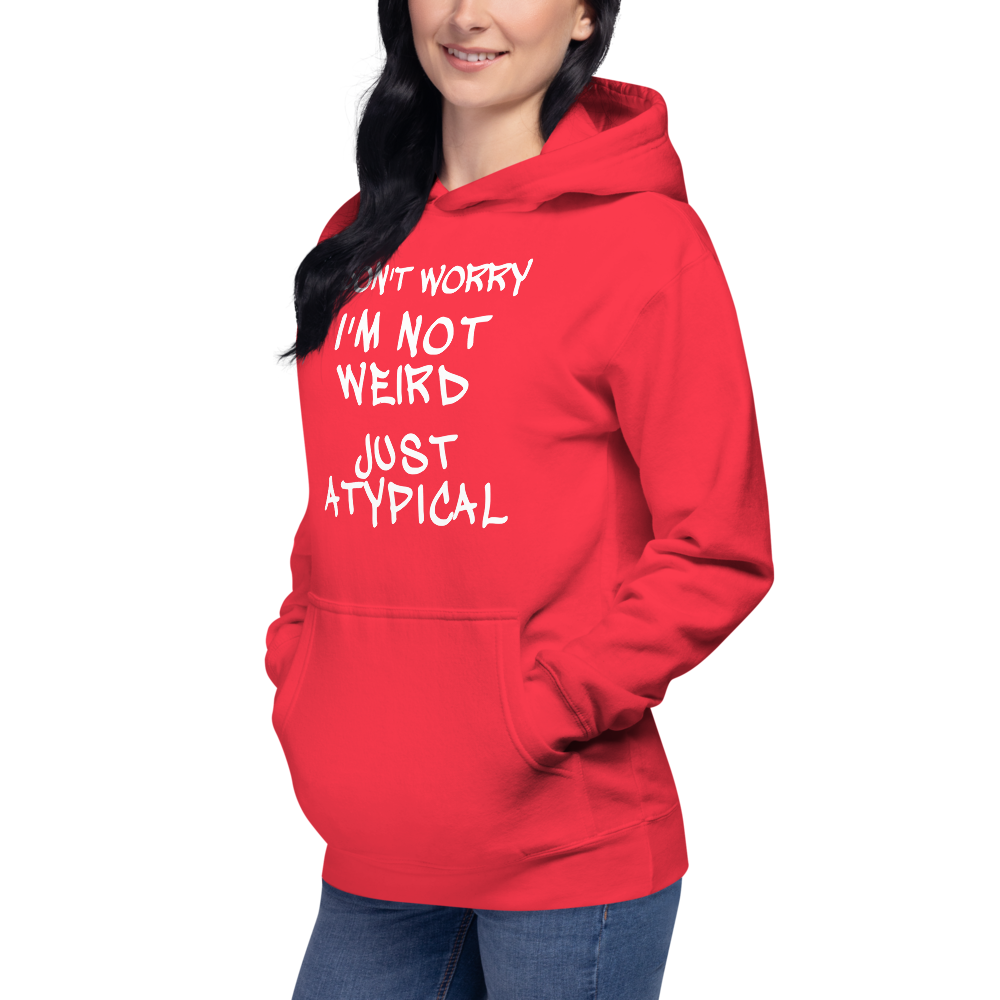 "Don't Worry I'm Not Weird Just Atypical" printed on a team red unisex hoodie worn by a female