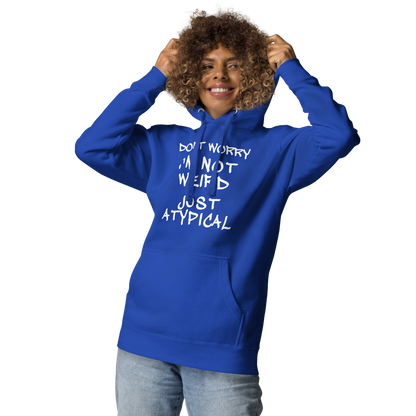 "Don't Worry I'm Not Weird Just Atypical" printed on a team royal unisex hoodie worn by a female