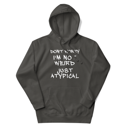 "Don't Worry I'm Not Weird Just Atypical" printed on a vintage black unisex hoodie laying on a flat surface with the hood up