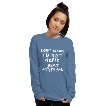 "Don't Worry I'm Not Weird Just Atypical" printed on a indigo blue men's long sleeve shirt worn by a female