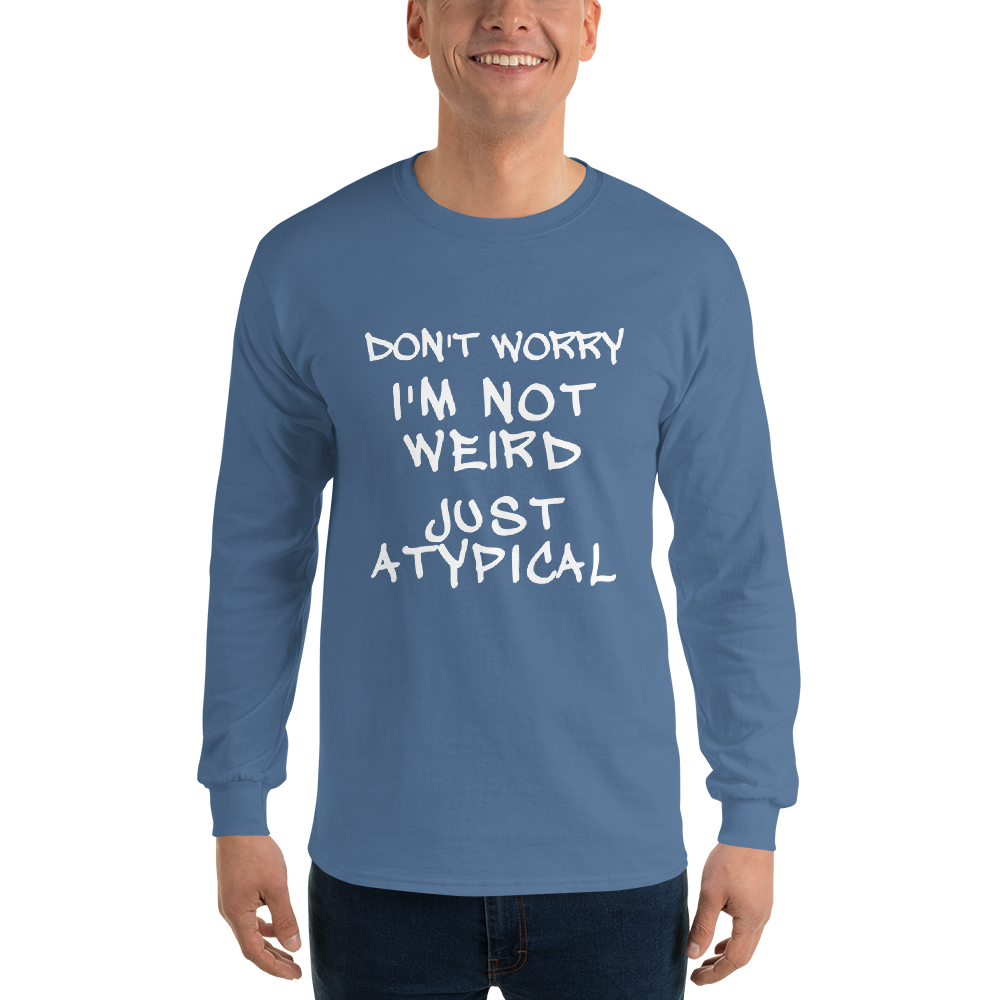 "Don't Worry I'm Not Weird Just Atypical" printed on a indigo blue men's long sleeve shirt worn by a male