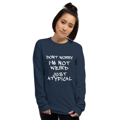 "Don't Worry I'm Not Weird Just Atypical" printed on a navy men's long sleeve shirt worn by a female