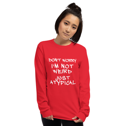 "Don't Worry I'm Not Weird Just Atypical" printed on a red men's long sleeve shirt worn by a female