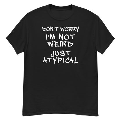 "Don't Worry I'm Not Weird Just Atypical" printed on a black unisex classic tee laying on a flat surface