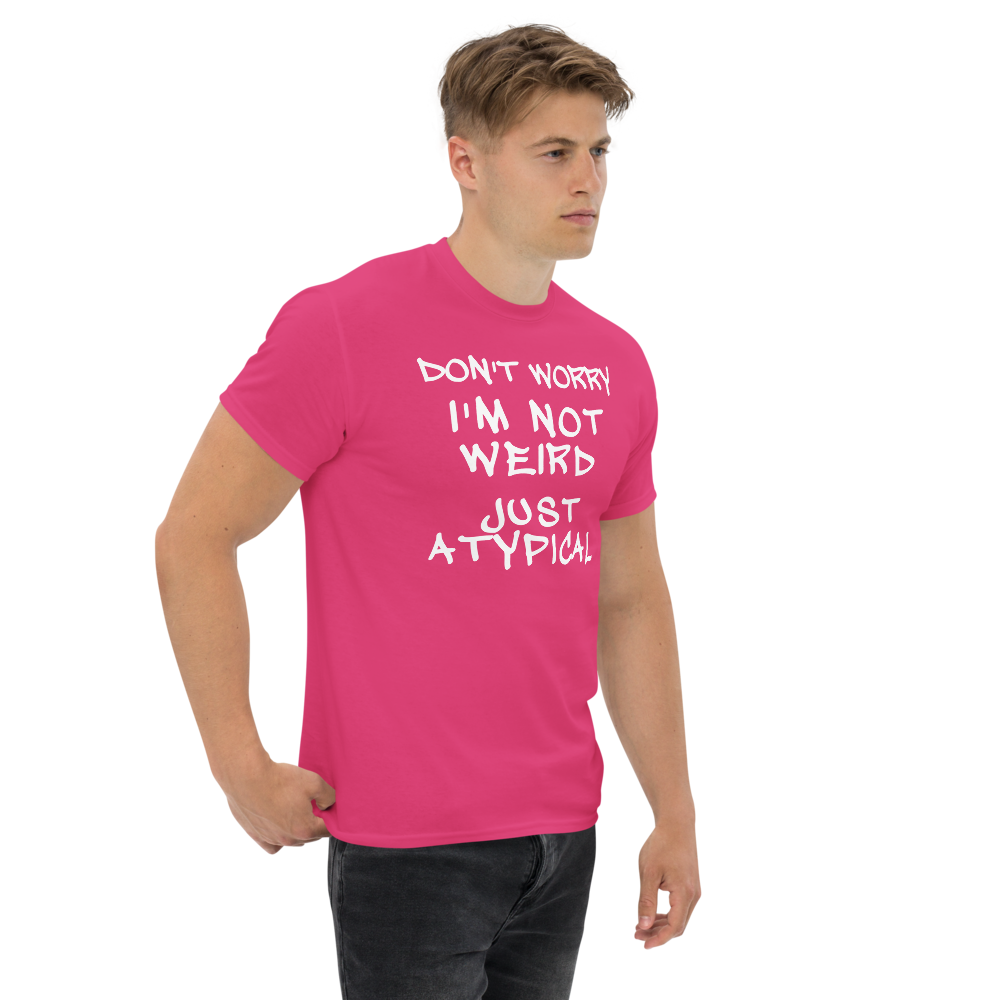 "Don't Worry I'm Not Weird Just Atypical" printed on a heliconia unisex classic tee worn by a male
