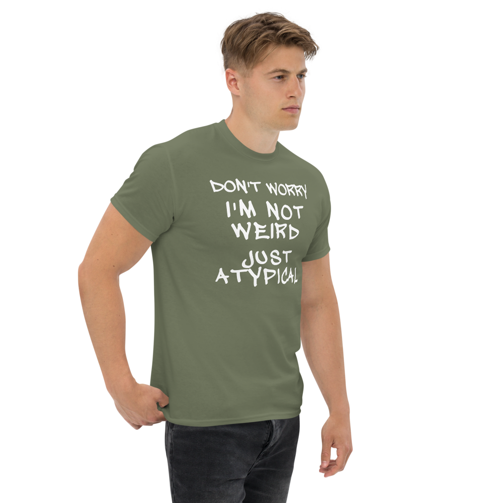 "Don't Worry I'm Not Weird Just Atypical" printed on a military green unisex classic tee worn by a male