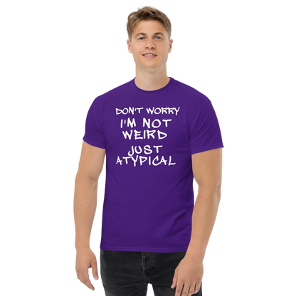 "Don't Worry I'm Not Weird Just Atypical" printed on a purple unisex classic tee worn by a male