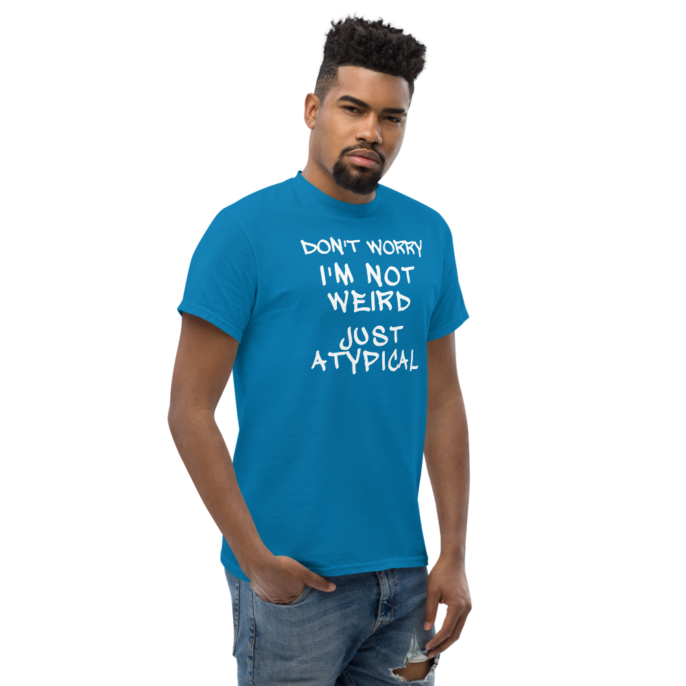 "Don't Worry I'm Not Weird Just Atypical" printed on a sapphire unisex classic tee worn by a male