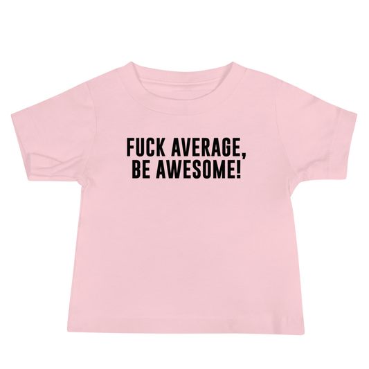 "Fuck Average, Be Awesome!" printed on a pink baby jersey short sleeve tee laying on a flat surface