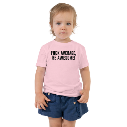 "Fuck Average, Be Awesome!" printed on a pink toddler short sleeve tee worn by a female