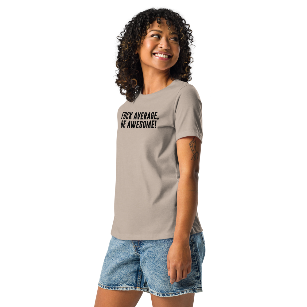"Fuck Average, Be Awesome!" printed on a heather stone women's relaxed t-shirt worn by a female