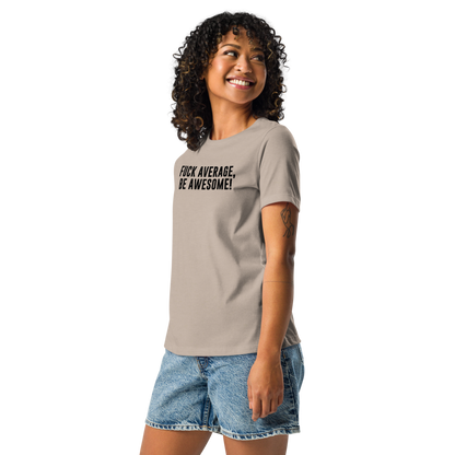"Fuck Average, Be Awesome!" printed on a heather stone women's relaxed t-shirt worn by a female