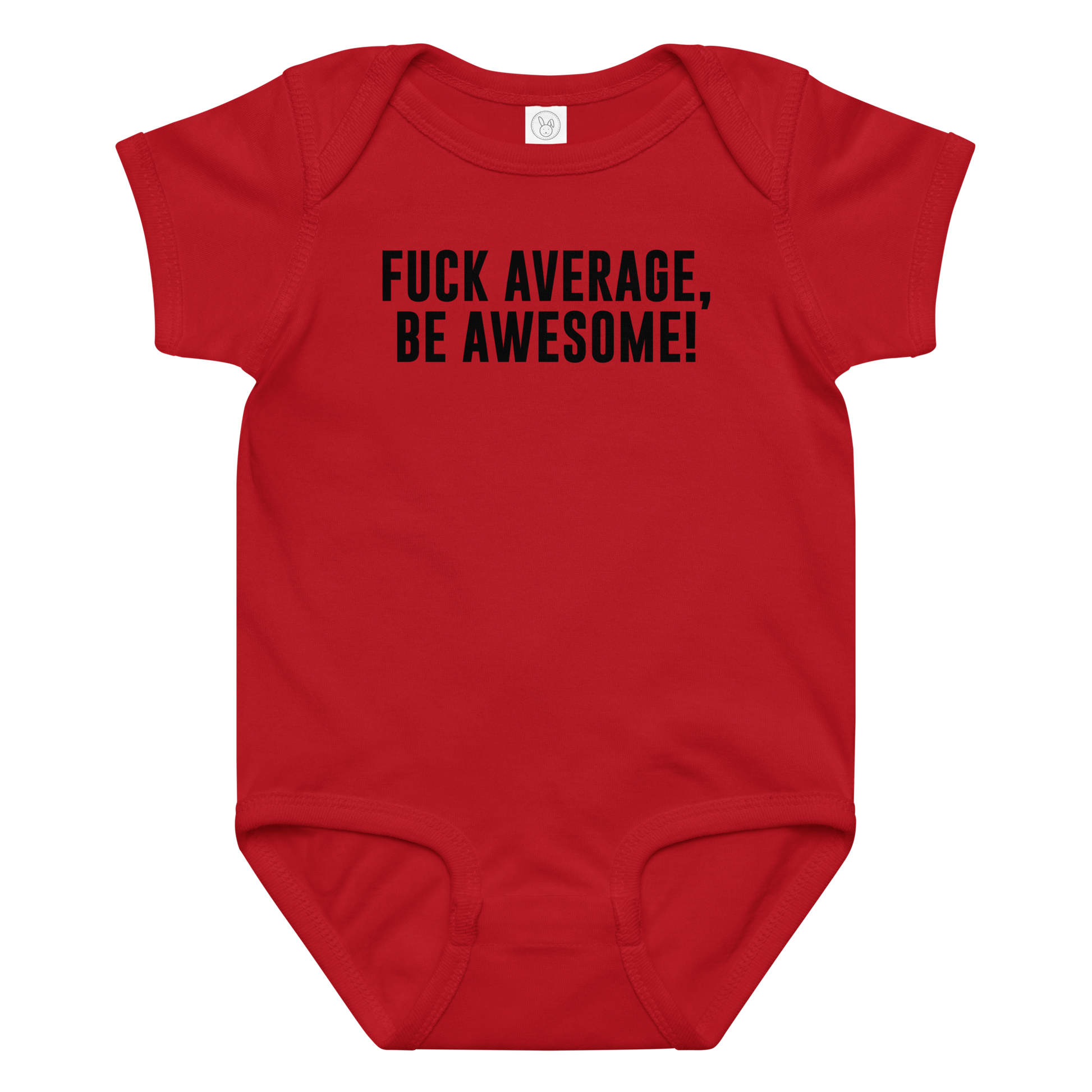 "Fuck Average, Be Awesome!" printed on a red baby jersey bodysuit laying on a flat surface amongst other clothes