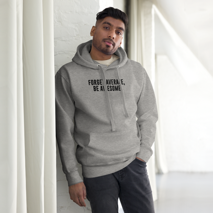 "Forget Average, Be Awesome!" printed on a carbon grey unisex hoodie worn by a male
