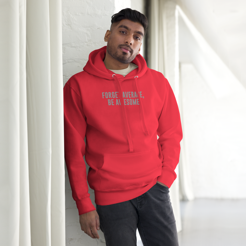 "Forget Average, Be Awesome!" printed on a team red unisex hoodie worn by a male