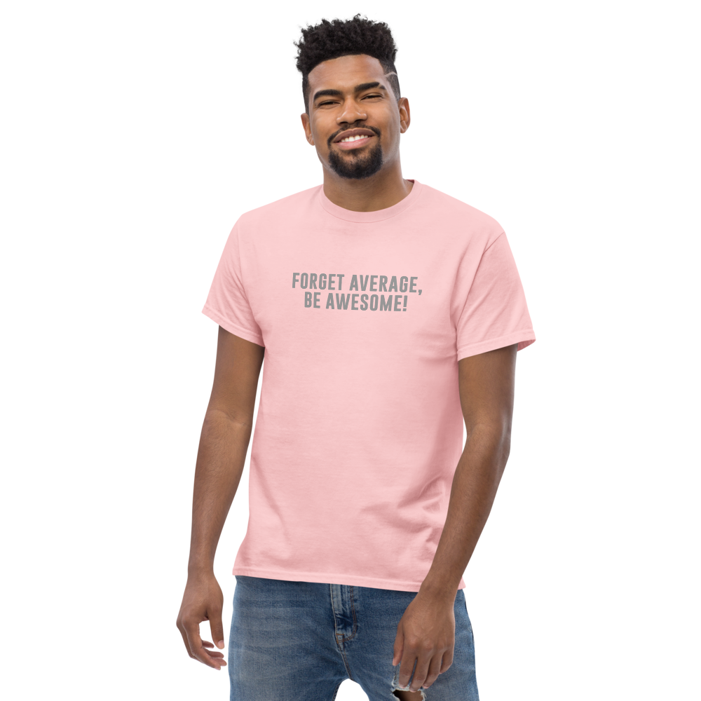 "Forget Average, Be Awesome!" printed on a light pink unisex classic tee worn by a male