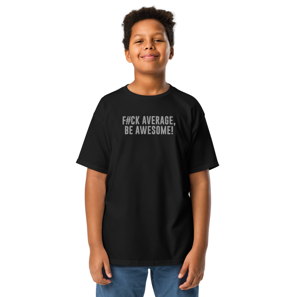 "F#Ck Average, Be Awesome!" printed on a black youth classic tee worn by a male