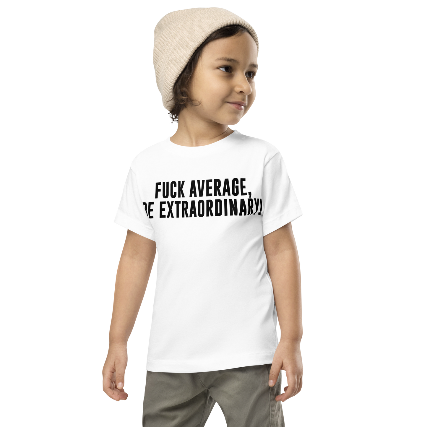 "Fuck Average, Be Extraordinary!" printed on a white toddler short sleeve tee worn by a male wearing a cap