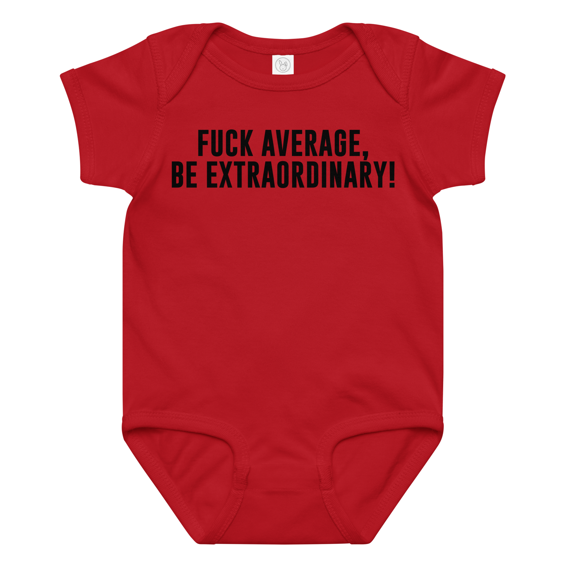 "Fuck Average, Be Extraordinary!" printed on a red baby jersey bodysuit laying on a flat surface amongst other clothes