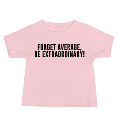 "Forget Average, Be Extraordinary!" printed on a pink baby jersey short sleeve tee laying on a flat surface
