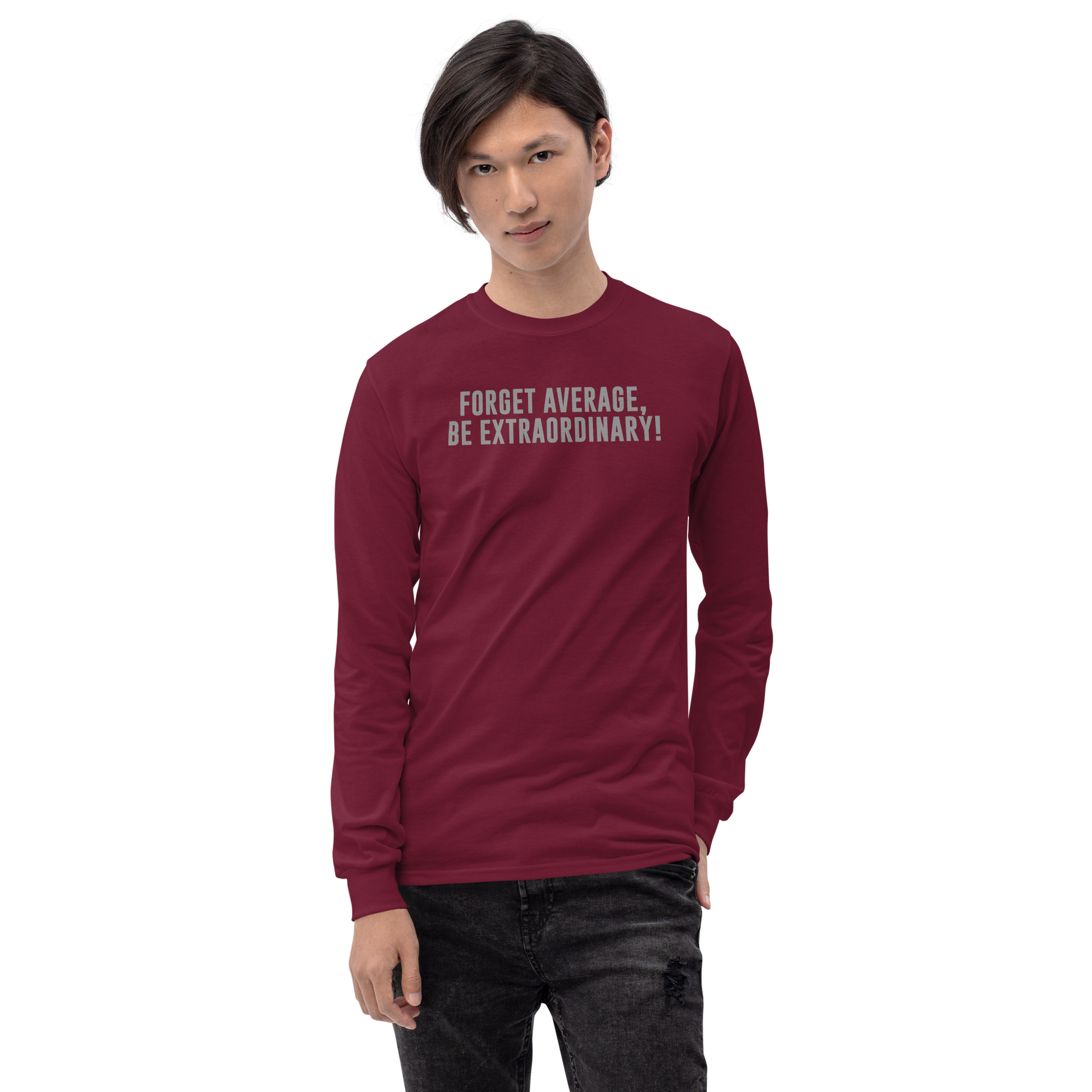 "Forget Average, Be Extraordinary!" printed on a maroon men's long sleeve shirt worn by a male
