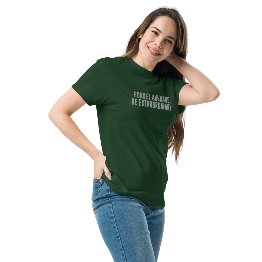 "Forget Average, Be Extraordinary!" printed on a forest green unisex classic tee worn by a female