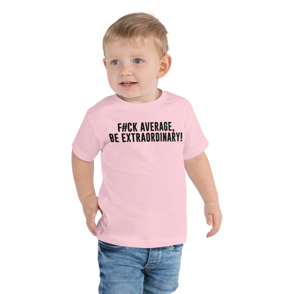 "F#Ck Average, Be Extraordinary!" printed on a pink toddler short sleeve tee worn by a male