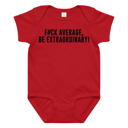 "F#Ck Average, Be Extraordinary!" printed on a red baby jersey bodysuit laying on a flat surface amongst other clothes