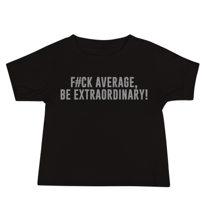 "F#Ck Average, Be Extraordinary!" printed on a black baby jersey short sleeve tee laying on a flat surface