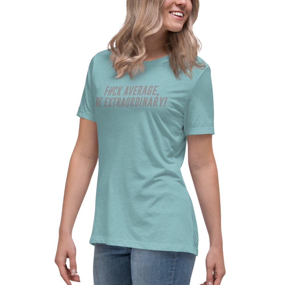 "F#Ck Average, Be Extraordinary!" printed on a heather blue lagoon women's relaxed t-shirt worn by a female