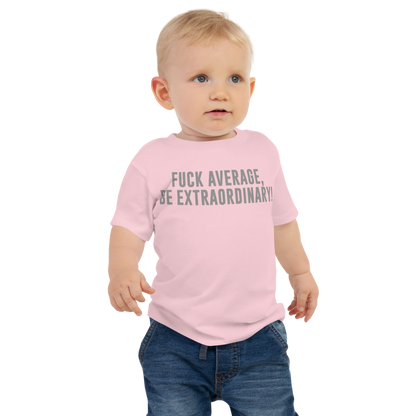 "Fuck Average, Be Extraordinary!" printed on a pink baby jersey short sleeve tee worn by a male