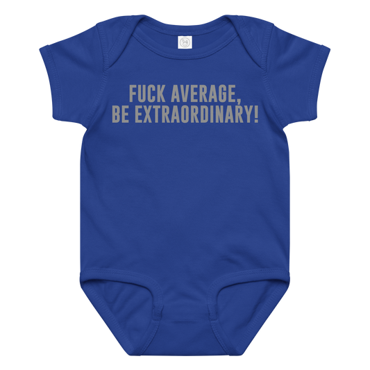 "Fuck Average, Be Extraordinary!" printed on a royal baby jersey bodysuit laying on a flat surface amongst other clothes