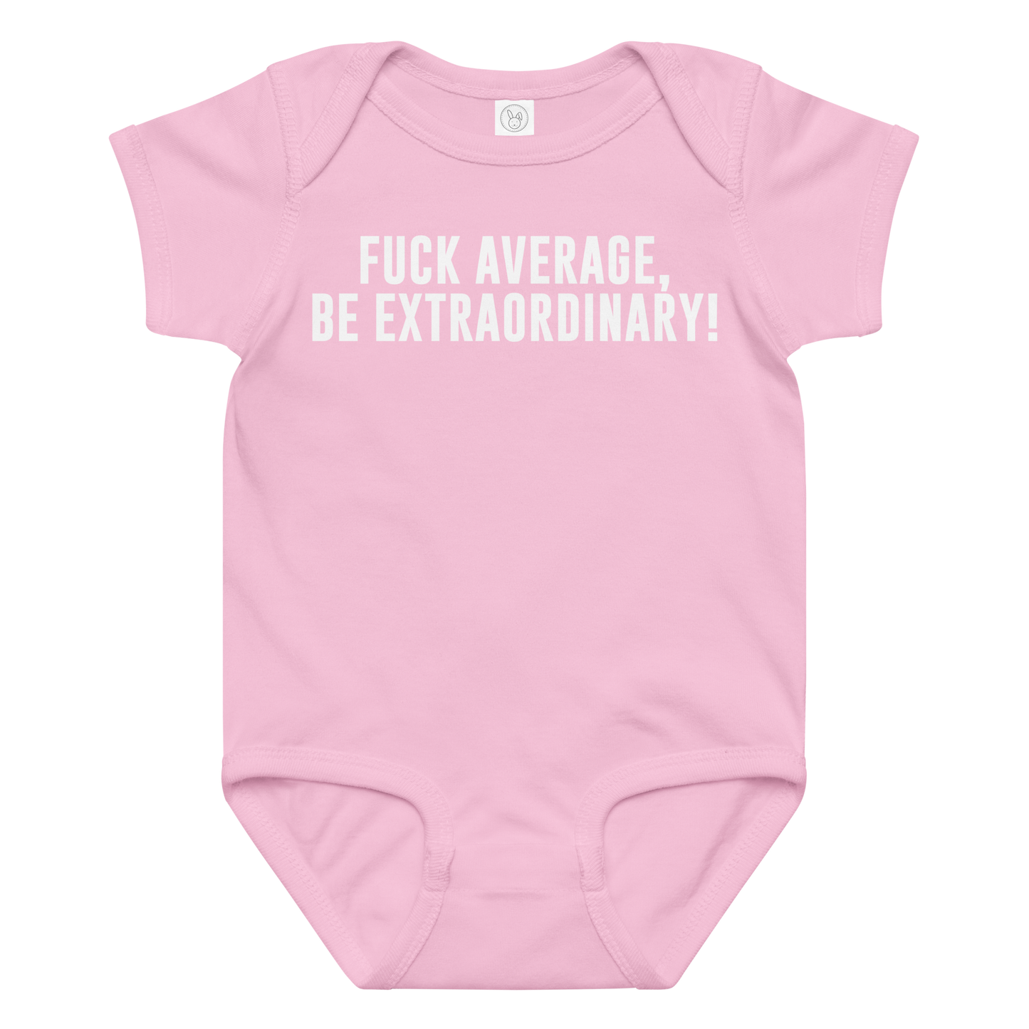 "Fuck Average, Be Extraordinary!" printed on a pink baby jersey bodysuit laying on a flat surface amongst other clothes