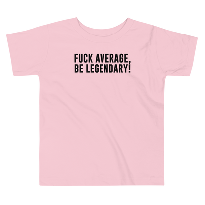 "Fuck Average, Be Legendary!" printed on a pink toddler short sleeve tee laying on a flat surface