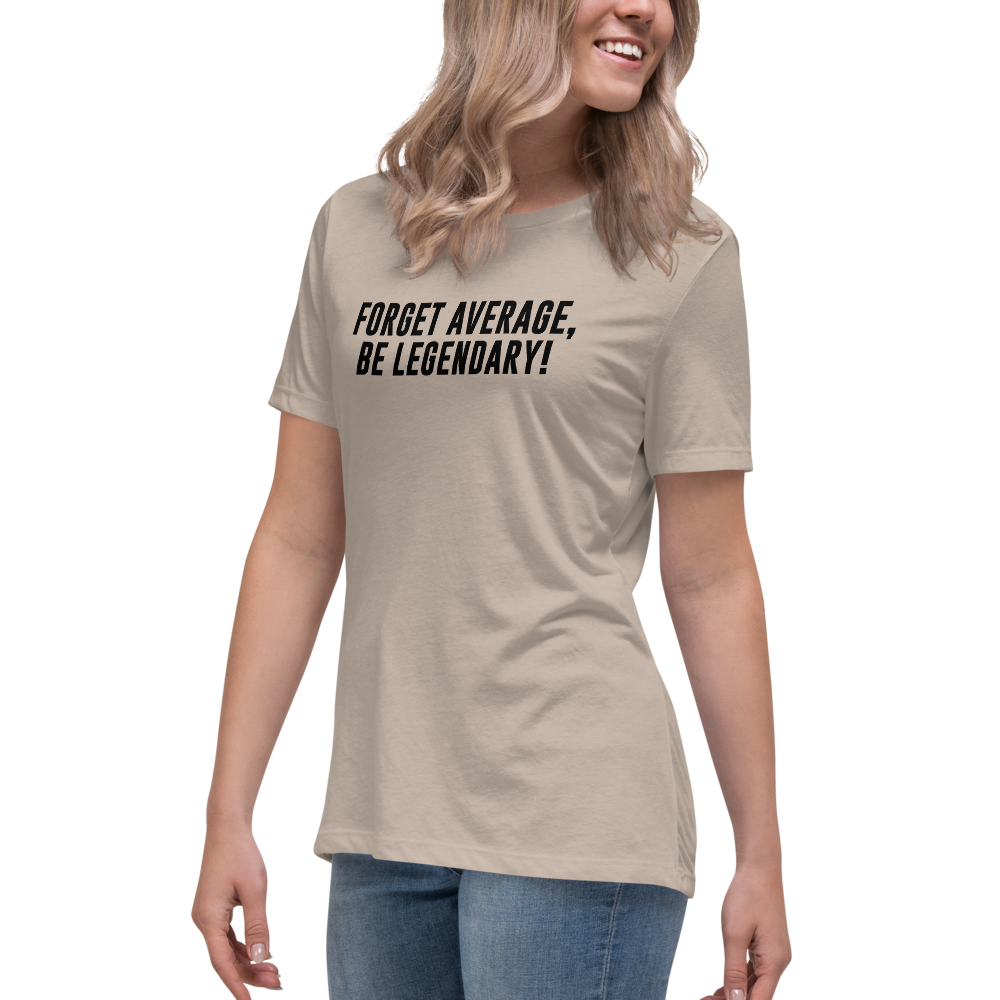 "Forget Average, Be Legendary!" printed on a heather stone women's relaxed t-shirt worn by a female
