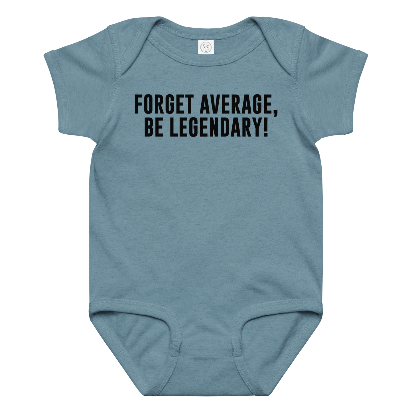 "Forget Average, Be Legendary!" printed on a vintage indigo baby jersey bodysuit laying on a flat surface amongst other clothes