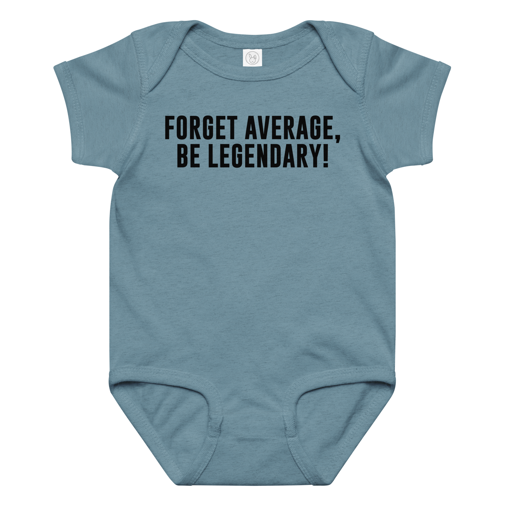 "Forget Average, Be Legendary!" printed on a vintage indigo baby jersey bodysuit laying on a flat surface amongst other clothes