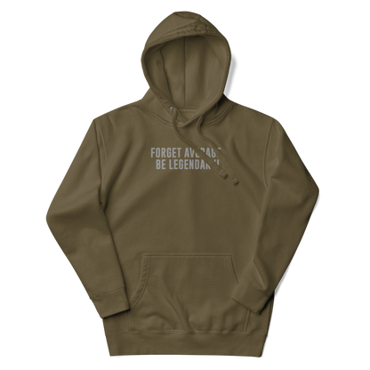 "Forget Average, Be Legendary!" printed on a military green unisex hoodie laying on a flat surface with the hood up