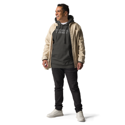 "Forget Average, Be Legendary!" printed on a vintage black unisex hoodie worn by a male with a jacket on top