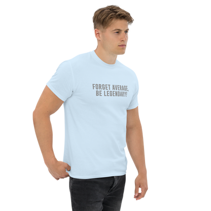 "Forget Average, Be Legendary!" printed on a light blue unisex classic tee worn by a male