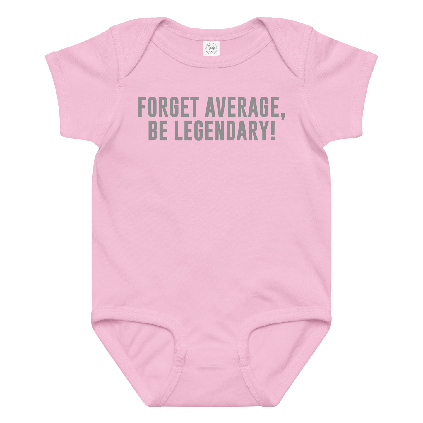 "Forget Average, Be Legendary!" printed on a pink baby jersey bodysuit laying on a flat surface amongst other clothes