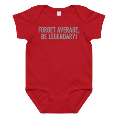 "Forget Average, Be Legendary!" printed on a red baby jersey bodysuit laying on a flat surface amongst other clothes